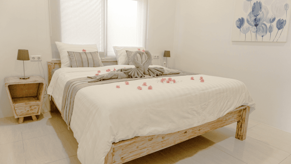 Private Villa Gili Air bedroom suite with swan towel setup